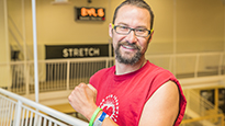 Heart transplant patient Jason Ewen in a gym